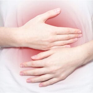 Arkansas Paraquat Lawsuit This image is of a person clutching abdomen due to paraquat exposure - Arkansas paraquat lawsuit